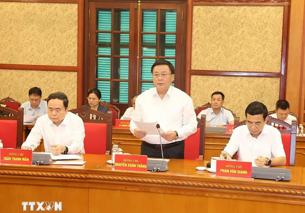 Giám đốc Học viện Chính trị quốc gia Hồ Chí Minh Nguyễn Xuân Thắng, Chủ tịch Hội đồng Lý luận Trung ương, Thường trực Tiểu ban, Tổ trưởng Tổ Biên tập Văn kiện. Ảnh: TTXVN tong-bi-thu-chu-tich-nuoc-to-lam-yeu-cau-quan-triet-sau-sac-3-nguyen-tac-xay-dung-van-kien-dai-hoi-xiv-3.jpg