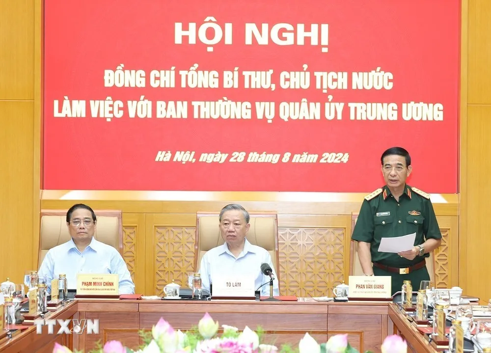 Đại tướng Phan Văn Giang, Ủy viên Bộ Chính trị, Phó Bí thư Quân ủy Trung ương, Bộ trưởng Bộ Quốc phòng phát biểu tại Hội nghị. Ảnh: TTXVN tong-bi-thu-chu-tich-nuoc-to-lam-ngan-nguy-co-xung-dot-tranh-bi-co-lap-le-thuoc-2.jpg