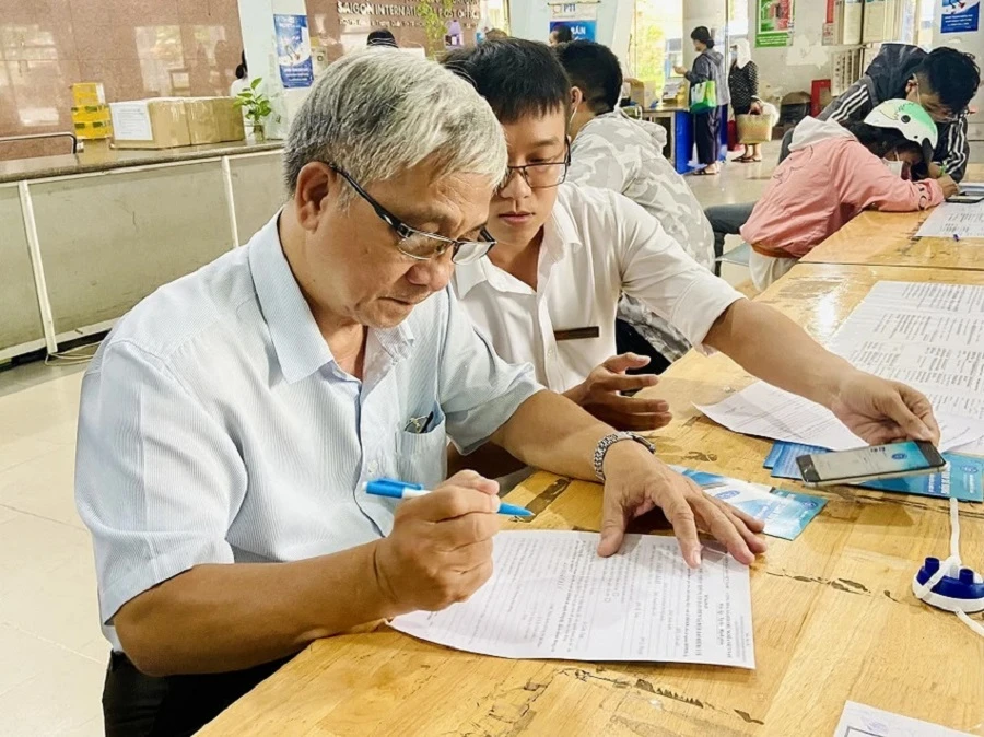 Chi trả an sinh xã hội không dùng tiền mặt.jpg