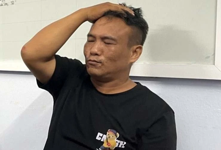 Nghi phạm Trần Đức Trình tại cơ quan công an quận Đồ Sơn. Ảnh: CACC