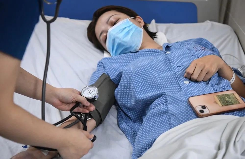 Bệnh nhân cúm A điều trị tại bệnh viện Thanh Nhàn, Hà Nội. Ảnh: NHƯ LOAN Bệnh nhân cúm A điều trị tại bệnh viện Thanh Nhàn, Hà Nội. Ảnh: NHƯ LOAN