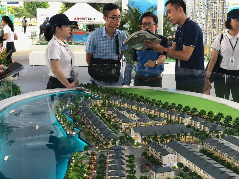 Hành lang pháp lý rõ ràng giúp ổn định tâm lý nhà đầu tư, mở nguồn cung cho người mua nhà. Ảnh: QH hinh-bat-dong-san-tphcm1_RCRU.jpg