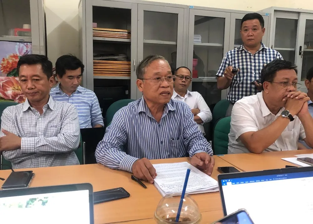 Ông Nguyễn Ngọc Nam, Trưởng ban tổ chức cuộc thi Gạo ngon Việt Nam năm 2022 (ngồi giữa) đang trả lời báo chí. (Ảnh: QH)