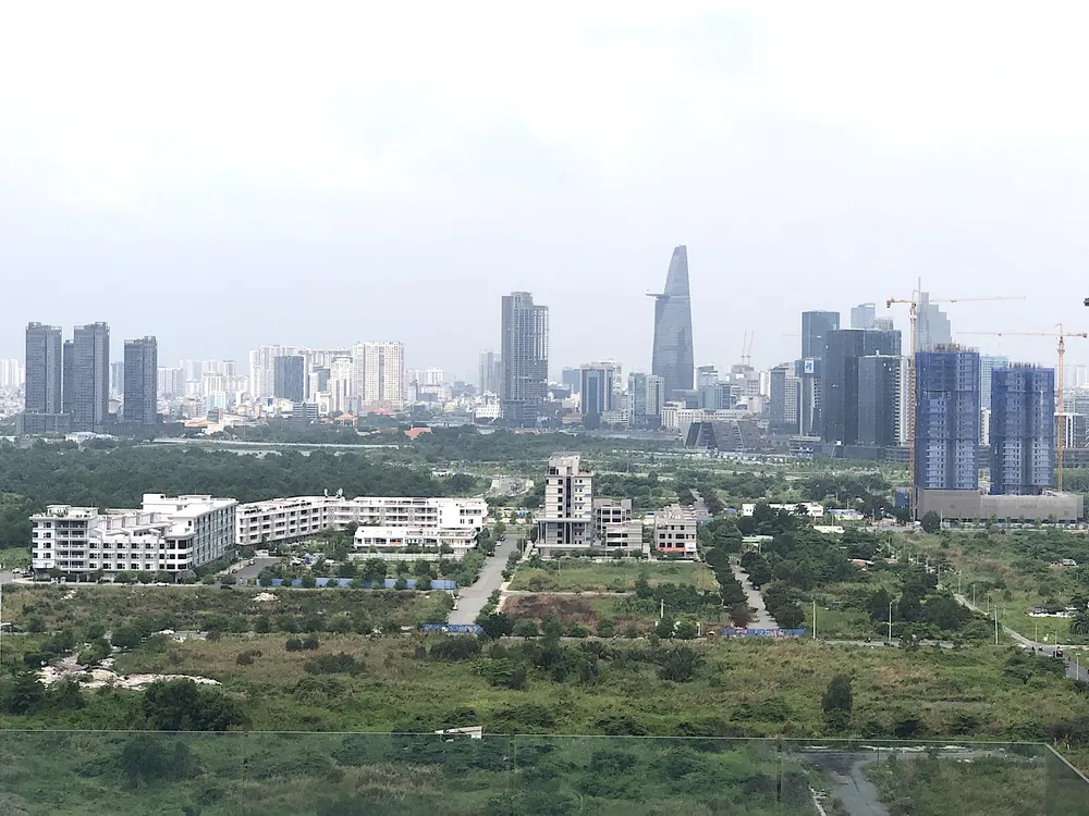 Nút thắt pháp lý được tháo gỡ nếu Quốc hội thông qua Đề án thí điểm thực hiện dự án nhà ở thương mại thông qua thỏa thuận về nhận quyền sử dụng đất hoặc đang có quyền sử dụng đất không phải là đất ở. Ảnh: QH bat-dong-san-tphcm1.jpg