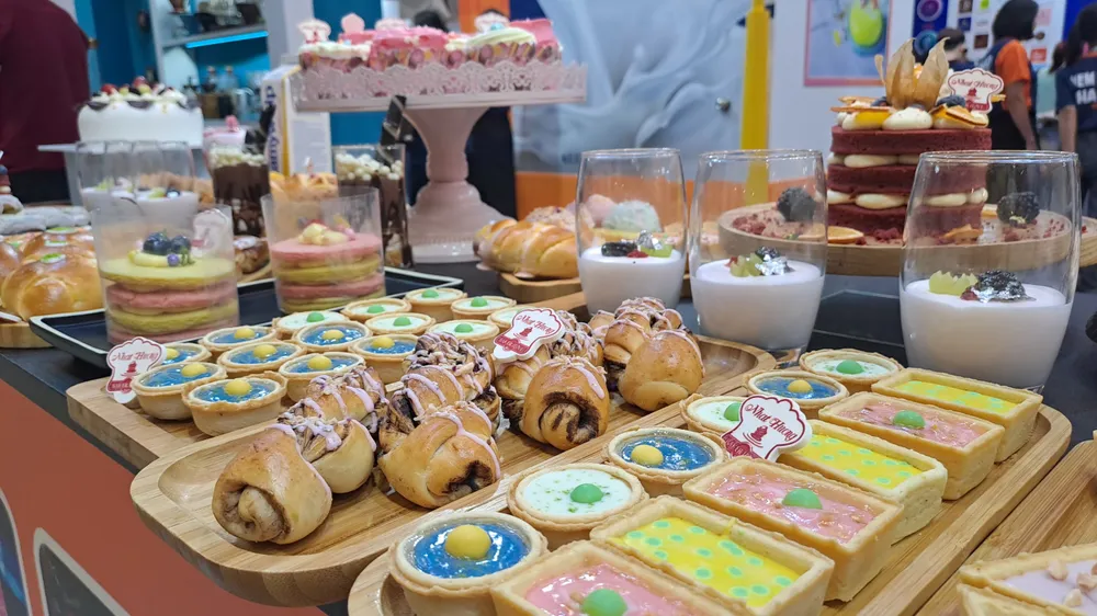 Không chỉ cà phê, nhiều doanh nghiệp cung ứng bánh cũng tham gia triển lãm. Ảnh: Thu Hà Không chỉ cà phê, nhiều doanh nghiệp cung ứng bánh cũng tham gia triển lãm. Ảnh: Thu Hà