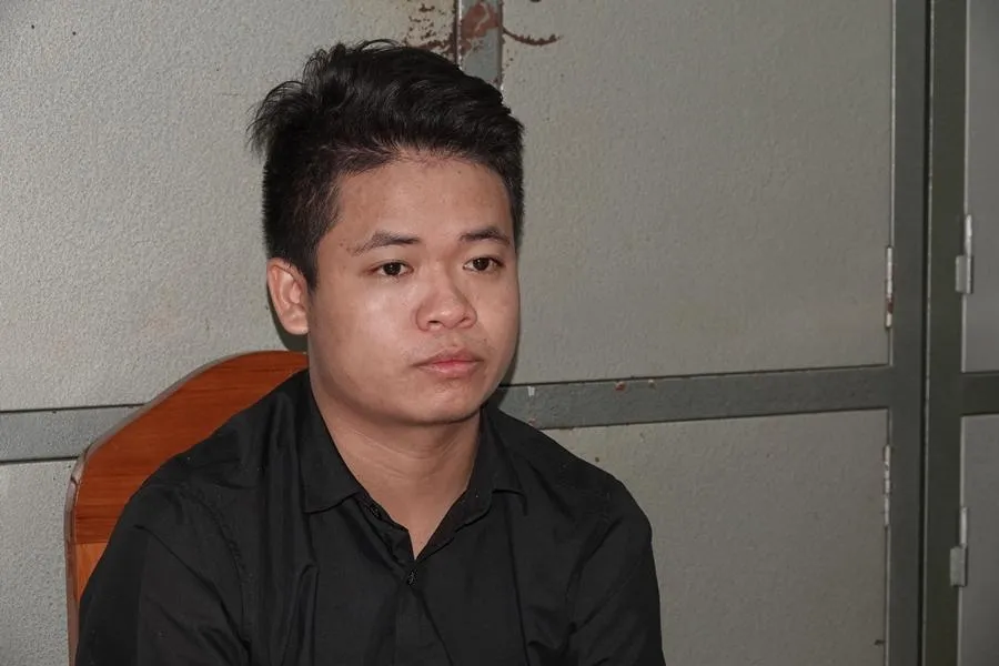 Ngô Đức Thắng tại cơ quan điều tra. Ảnh: NY.