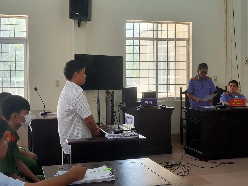 Bị cáo Lê Tiến Danh tại phiên tòa. Ảnh: PĐ Bị cáo Lê Tiến Danh tại phiên tòa. Ảnh: PĐ