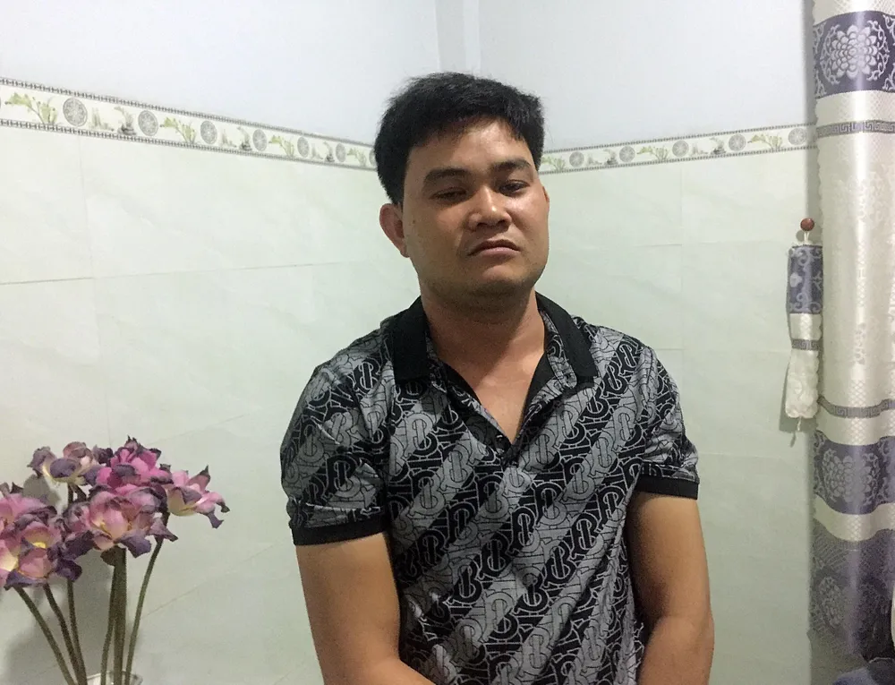 Nguyễn Ánh Đọt, nghi can cầm đầu đường dây lúc bị bắt giữ. Ảnh PĐ.