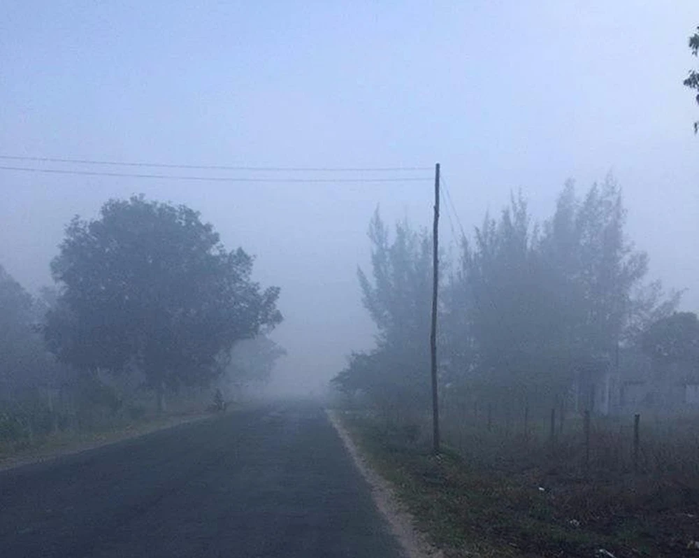 Bãi rác Tân Lập bị cháy hồi năm 2017, khói bốc mù mịt. Ảnh: PN