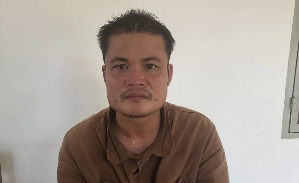 Nguyễn Tăng Minh tại cơ quan công an. Ảnh NHƯ Ý. tỉnh Bình Thuận