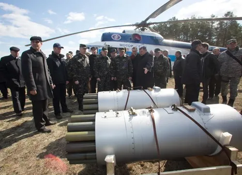 Acting Minister of Defense of Ukraine Mikhail Koval (R) and Olexander Turchynov, speaker of the parliament and the interim president, attend military exercises in Desna, Chernihiv region on April 2, 2014.