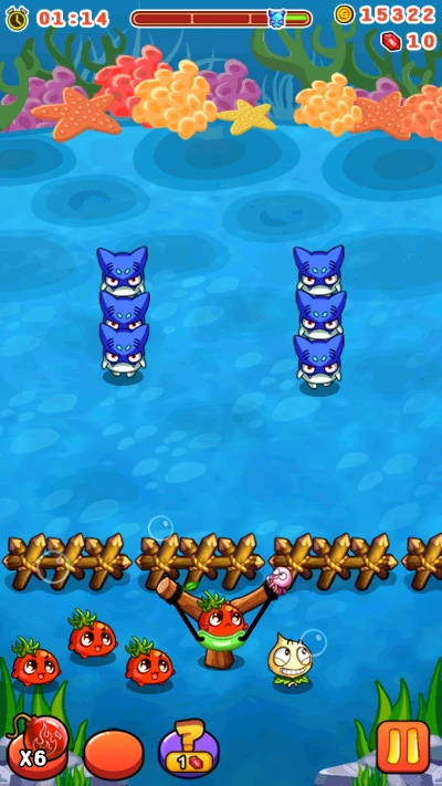 Người chơi kéo nhân vật cà chua để bắn các quái vật