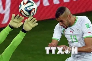 Slimani trở thành người hùng của Algeria khi anh ghi bàn thắng gỡ hòa 1-1 cho đội tuyển Algeria trước đội tuyển Nga. (Nguồn: AFP/TTXVN)