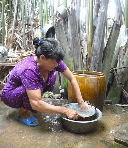 Phải cân bằng giá nước nội, ngoại thành ảnh 1