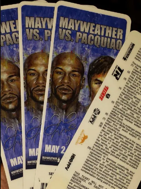 Mỗi tấm vé vào xem trận so găng lịch sử Mayweather - Pacquiao đang được hét giá gần 350.000 đôla ngoài chợ đen. ve-9318-1430436155.jpg