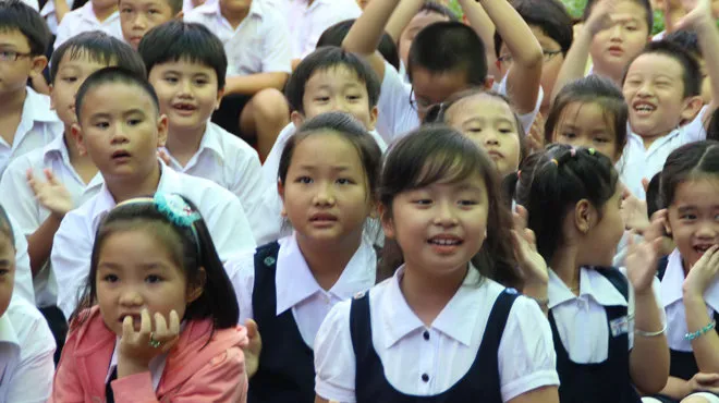 Học sinh TP.HCM trong ngày khai giảng năm học mới - Ảnh tư liệu TT