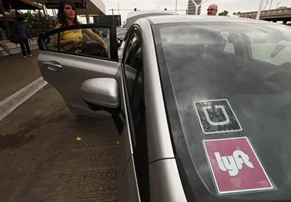 Giám đốc của Lyft bị nghi ngờ đã tấn công Uber ảnh 1
