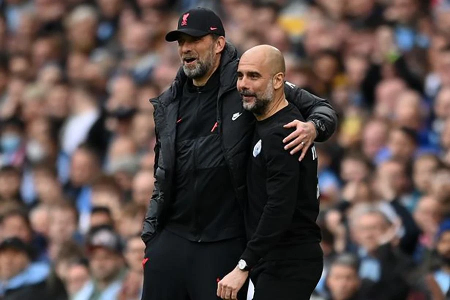 Klopp hướng đến cú ăn bốn cùng Liverpool, còn với Pep Guardiola là cú ăn ba cùng Man City. ẢNH: GETTY