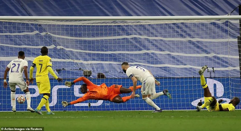 Benzema ghi bàn quyết định. ẢNH: REUTERS Real Madrid loại Chelsea đầy kịch tính. ẢNH: GETTY Benzema ghi bàn quyết định. ẢNH: REUTERS Real Madrid loại Chelsea đầy kịch tính. ẢNH: GETTY