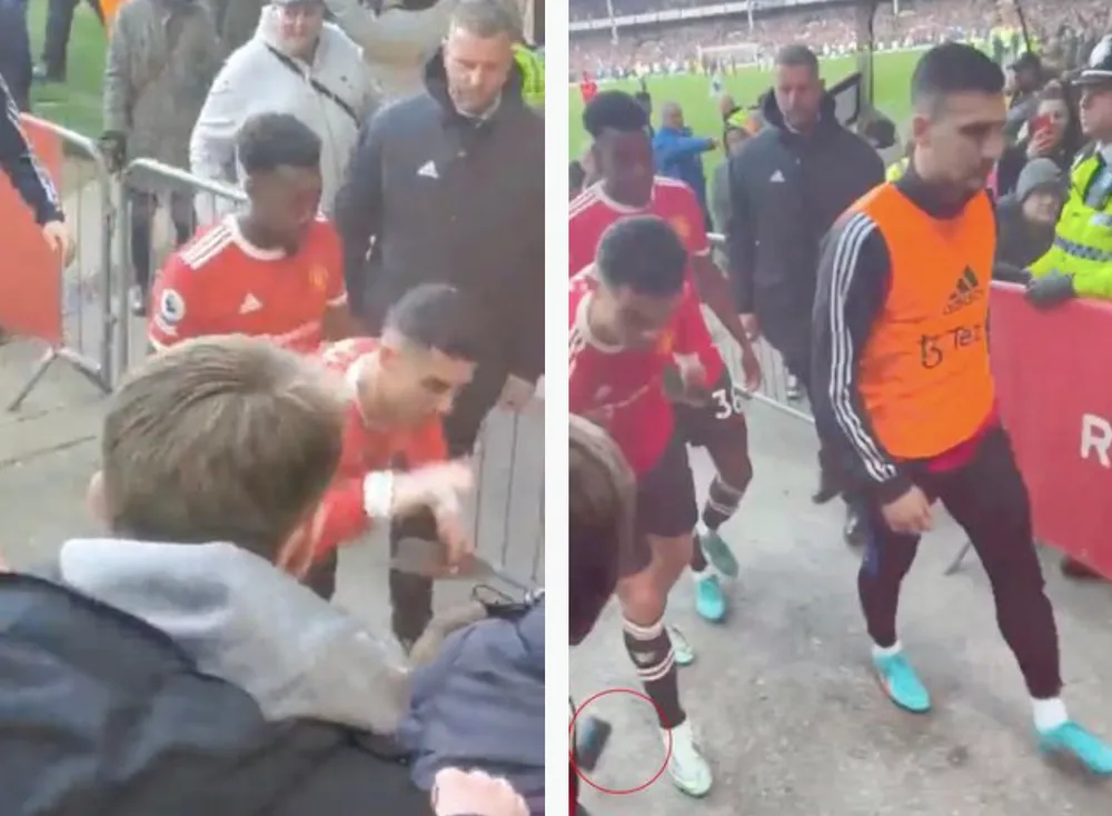Ronaldo đã đập điện thoại khỏi tay của fan nhí. ẢNH: MIRROR Ronaldo đã đập điện thoại khỏi tay của fan nhí. ẢNH: MIRROR
