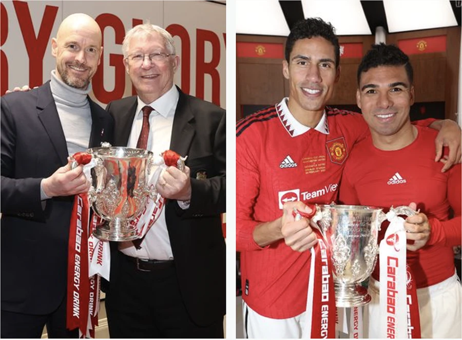 Sir Alex cùng Ten Hag nâng cúp trong phòng thay đồ, tương tự là bộ đôi Varane và Casemiro. ẢNH: GETTY
