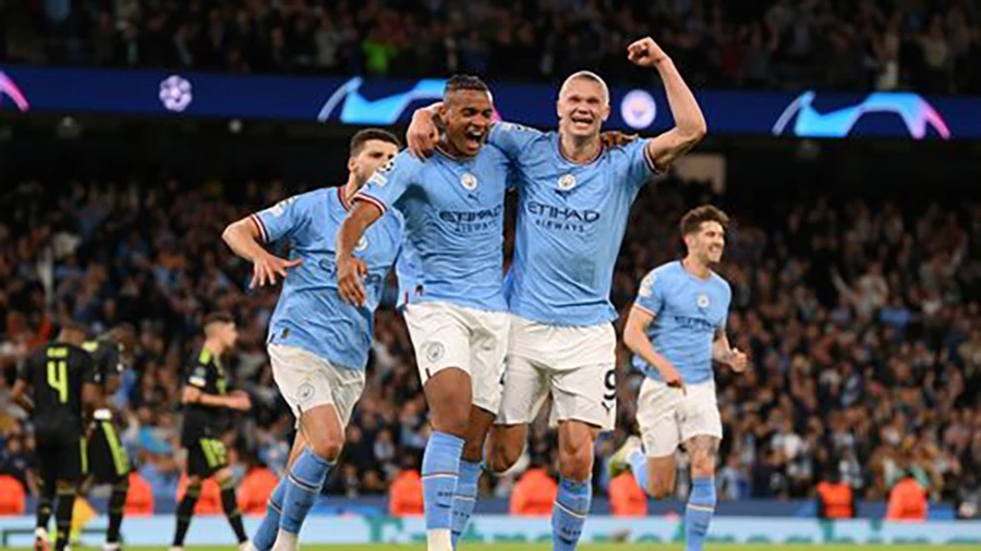 Man City đang nhắm đến mục tiêu giành cú ăn ba lịch sử để sánh ngang với MU. ẢNH: GETTY