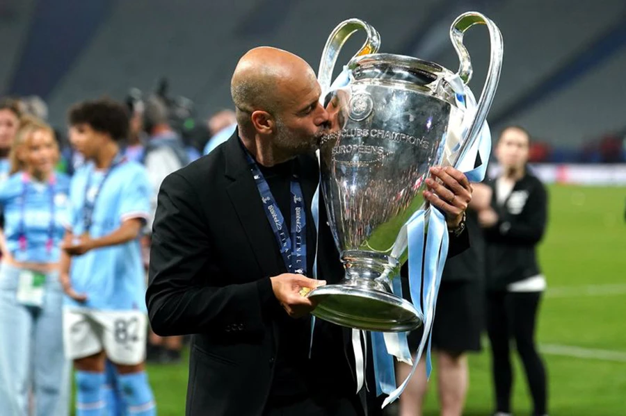 Pep Guardiola ăn mừng danh hiệu Champions League thứ ba trong sự nghiệp huấn luyện của ông. ẢNH: PA