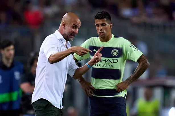 Pep Guardiola sẵn sàng để Cancelo đến bất cứ đâu, kể cả kình địch MU. ẢNH: GETTY Pep Guardiola sẵn sàng để Cancelo đến bất cứ đâu, kể cả kình địch MU. ẢNH: GETTY