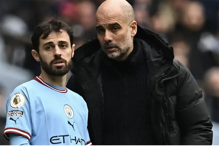 HLV Pep Guardiola có thể mất Silva vào tay đội bóng cũ Barcelona. ẢNH: SUN SPORTS
