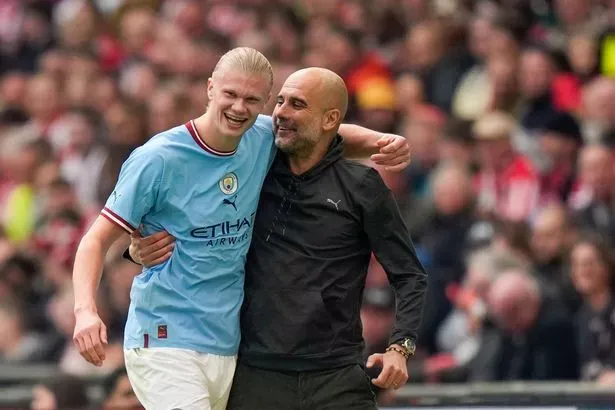 Pep Guardiola có vai trò lớn trong việc phát triển sự nghiệp của Haaland tại Man City. ẢNH: AP pep-guardiola-erling-haaland.jpg