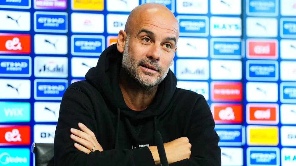 HLV Pep Guardiola của Man City đồng cảm với những gì đang xảy ra tại MU. ẢNH: GETTY Pep Guardiola
