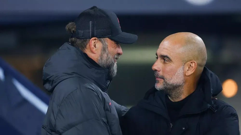 Jurgen Klopp và Pep Guardiola sẽ có lần đối đầu cuối cùng tại Premier League. ẢNH: GETTY pep-guardiola-jurgen-klopp.jpg