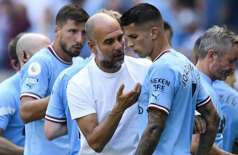 man-city-cancelo-pep-guardiola.png