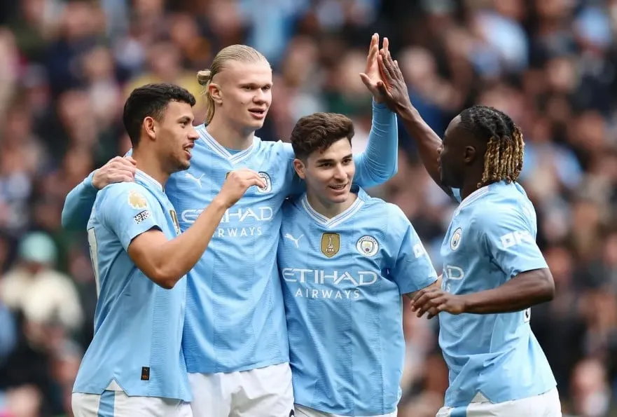 Man City đang nỗ lực bảo vệ chức vô địch Premier League của mình. Ảnh: Getty man city
