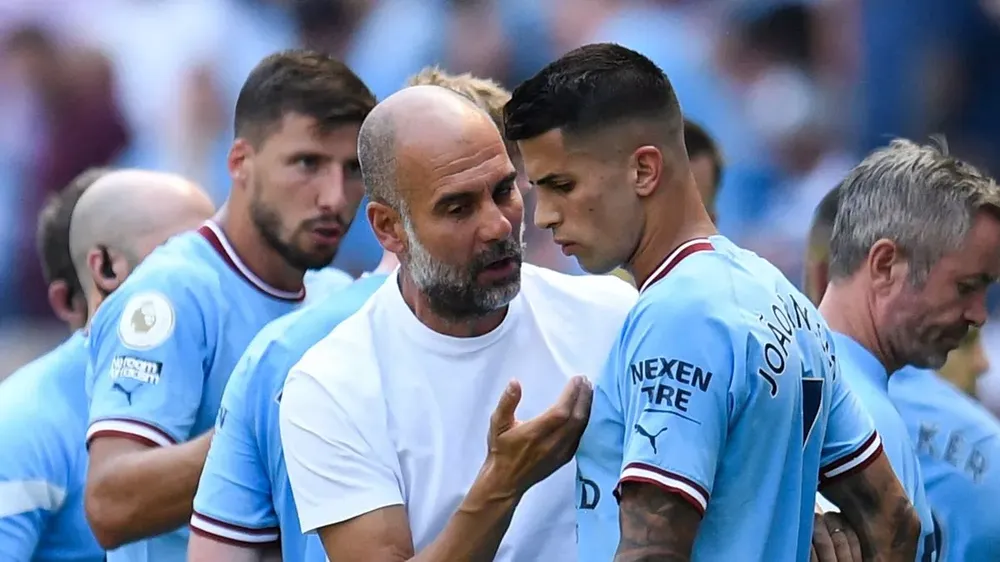 HLV Pep Guardiola mâu thuẫn với Joao Cancelo cách đây gần 2 năm. ẢNH: GETTY hlv pep guardiola, MAN CITY