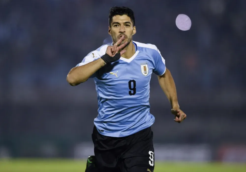 Suarez ghi 69 bàn sau 142 trận chơi cho tuyển Uruguay. ẢNH: AFP uruguay-luis-suarez.png