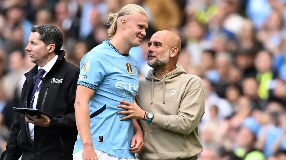 Pep Guardiola kinh ngạc trước việc Haaland ghi bàn liên tục và sắp phá kỷ lục lịch sử của Ronaldo. ẢNH: GETTY kỷ lục lịch sử của Ronaldo,Haaland,Ronaldo