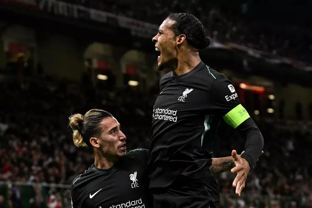 Đội trưởng Van Dijk ghi bàn trong đêm Champions League không thể quên. ẢNH: GETTY van-dijk-liverpool.jpg