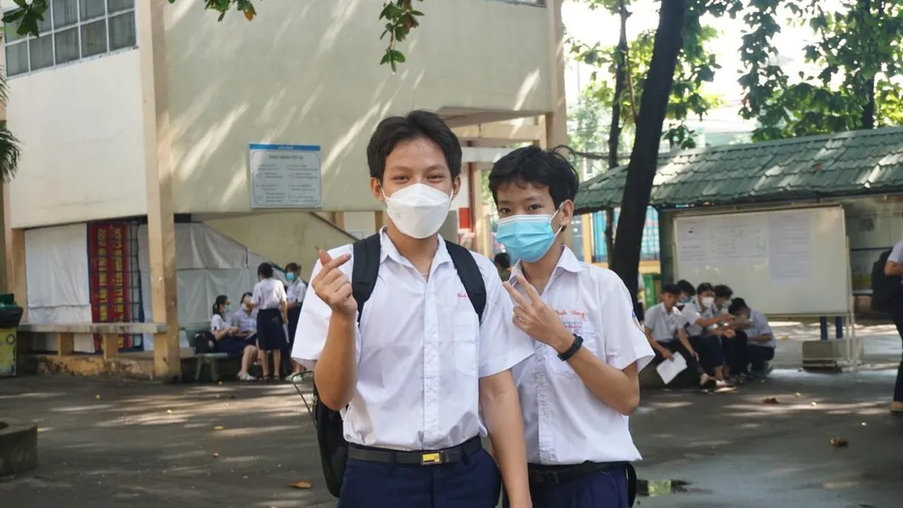 Thí sinh tại điểm thi trường THCS Trần Quang Khải, quận 12. Ảnh: NGUYỄN QUYÊN