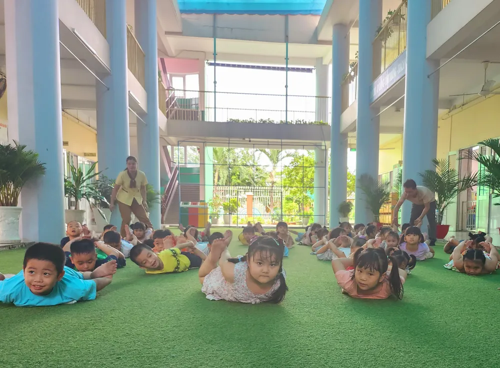 TP.HCM kiến nghị ưu tiên quỹ đất xây trường mầm non trong KCN - KCX. Trong ảnh, các bé Trường mầm non 30-4 trong 1 tiết học nhịp điệu. Ảnh: NGUYỄN QUYÊN quy-dat-xay-truong.jpg