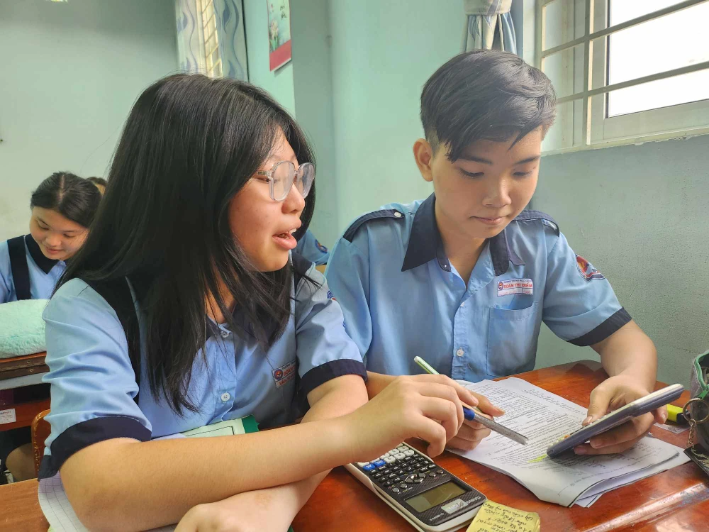 Học sinh lớp 9 Trường THCS Đoàn Thị Điểm, quận 3 trong 1 giờ học. Ảnh: NGUYỄN QUYÊN 158 điểm thi vào lớp 10