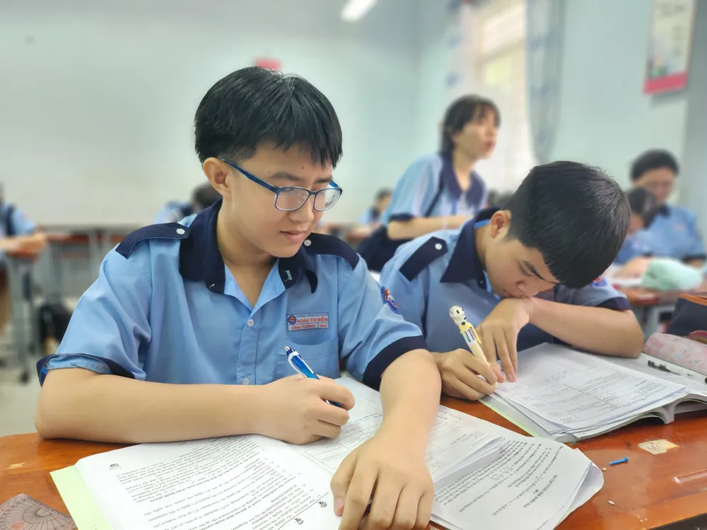 Học sinh lớp 9 Trường THCS Đoàn Thị Điểm, quận 3 trong một giờ học. Ảnh: NGUYỄN QUYÊN căn cước công dân