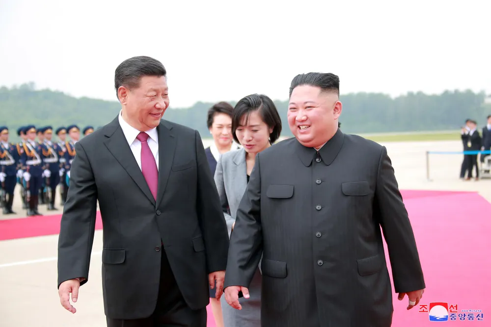 Chủ tịch Trung Quốc Tập Cận Bình và nhà lãnh đạo Triều Tiên Kim Jong-un. Ảnh: KCNA.