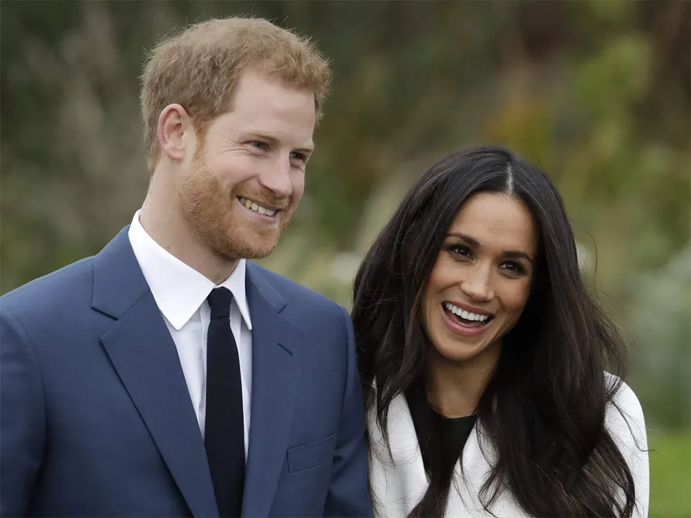 Hoàng tử Harry và vợ là Công nương Meghan. Ảnh: THE ECONOMIST