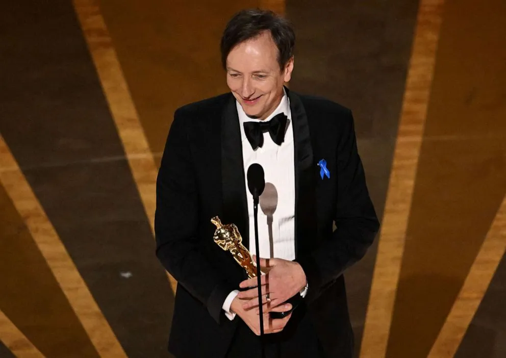 Nhà soạn nhạc người Đức Volker Bertelmann nhận giải Oscar cho hạng mục Nhạc phim gốc hay nhất với phim "All Quiet on the Western Front". Ảnh: AFP Nhà soạn nhạc người Đức Volker Bertelmann nhận giải Oscar cho hạng mục Nhạc phim gốc hay nhất với phim "All Quiet on the Western Front". Ảnh: AFP