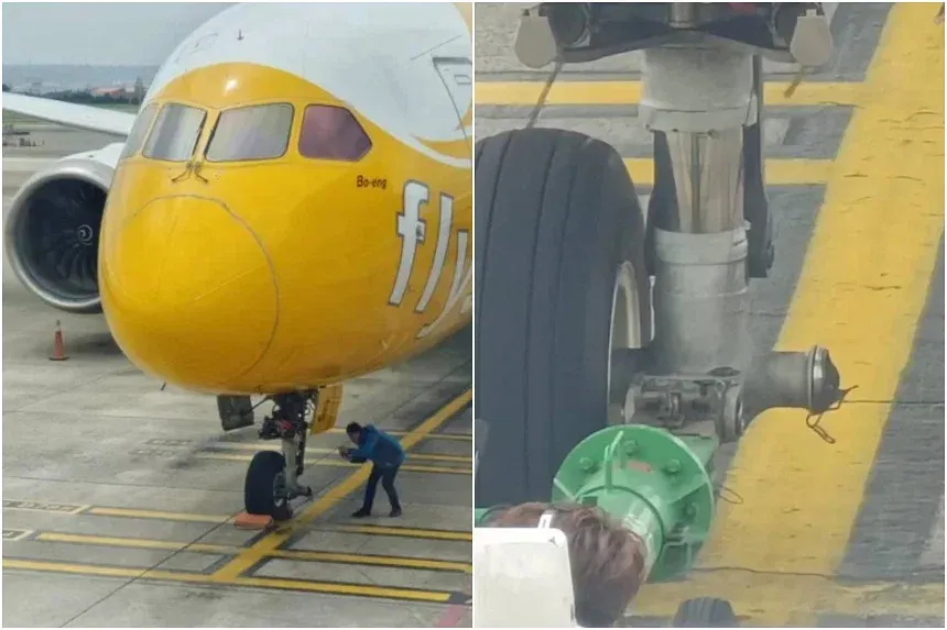 Bánh trước bên trái của máy bay bị rơi ra. Ảnh: UNITED DAILY NEWS