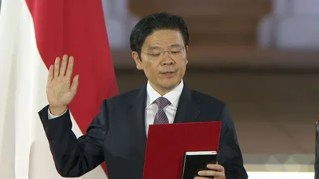 Ông ng Lawrence Wong (Hoàng Tuần Tài) tuyên thệ nhậm chức thủ tướng Singapore ngày 15-5. Ảnh: CNA Singapore.jpg