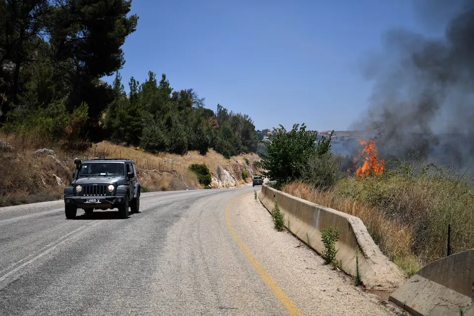 Ngọn lửa bùng lên ở miền bắc Israel hôm 18-6 trong bối cảnh căng thẳng Israel - Hezbollah. Ảnh: REUTERS cang-thang-israel-hezbollah-1.jpg