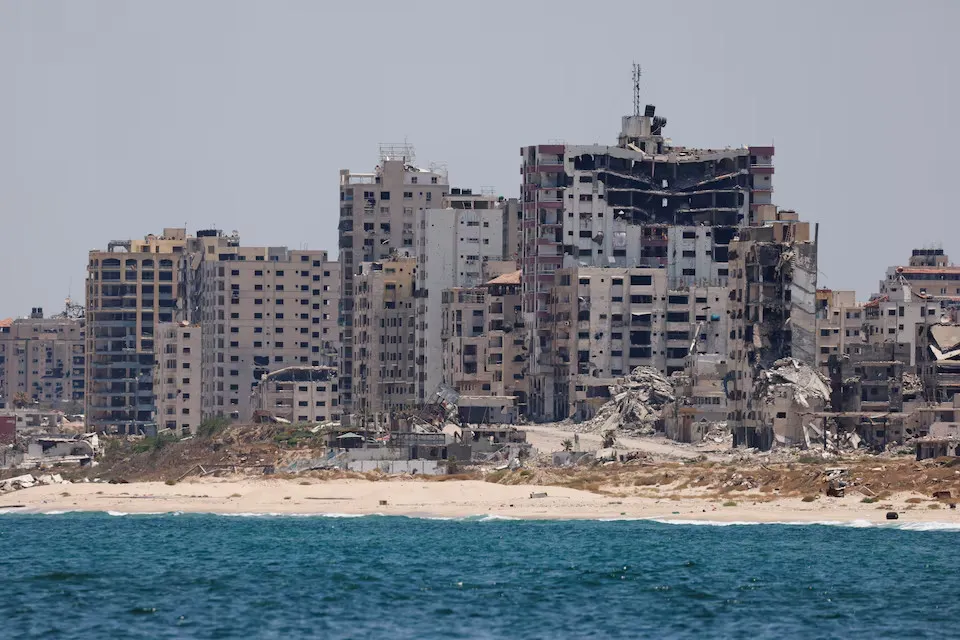 Các tòa nhà bị phá hủy ở Gaza ngày 25-6. REUTERS muc-do-de-doa-cua-hamas-voi-israel-1.jpg