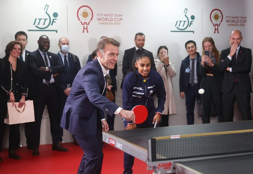French President Emmanuel Macron meets with Chinese and French table tennis players participatin.jpg